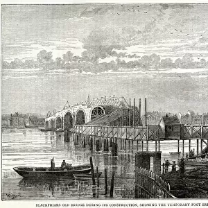 Blackfriars old bridge during construction, showing the temporary foot bridge