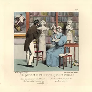 Bookish woman in a library talking to an author