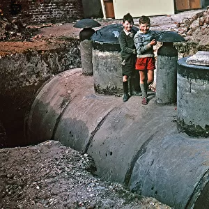Two boys explore nuclear fallout shelter, Deal, Kent