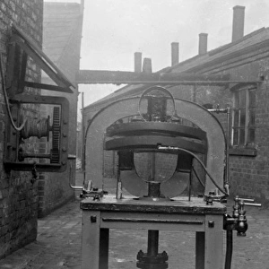 Brim Press machine at hatworks