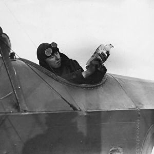 British pilot with messenger pigeon, WW1