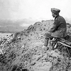 British soldier on muddy hill, Western Front, WW1
