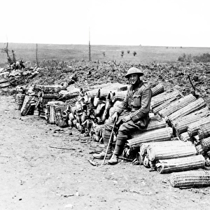 British soldier sitting at roadside, Western Front, WW1