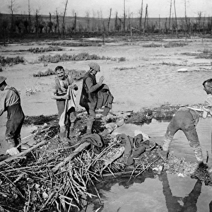 British soldiers washing in swamp, Somme, WW1