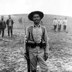 Burmese soldier with rifle and bayonet, WW1