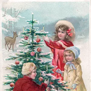 Children decorating a tree on a Christmas postcard