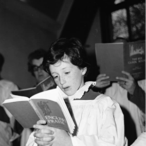Choirboy singing in a church choir, Horley, Surrey