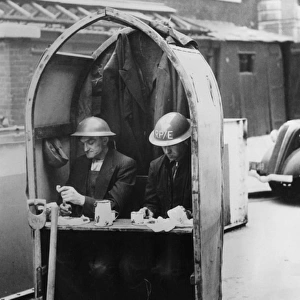 A Cosy Diner - Workmen have lunch amid the air raids