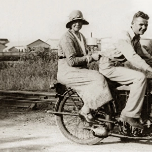 Couple on an early 1900s vintage motorcycle, 1900s