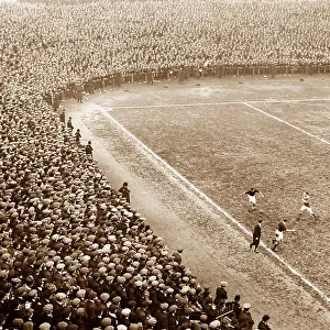 A crowd at a football match, early 1900s