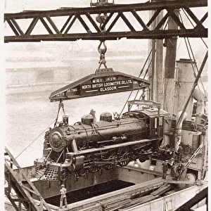 One of the eight engines built under contract by the North British Locomotive Company, Ltd, being shipped aboard the M. V Beldis. Date: 1933