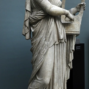 Erato. Statue of Muse of lyric poetry playing the zither
