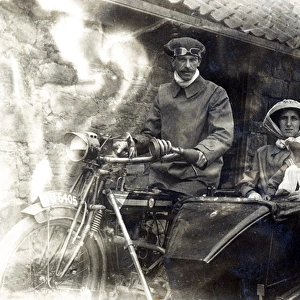 Family of three on a 1914 Twin Rex motorcycle & sidecar