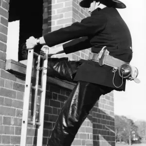Firefighter during Hook Ladder Practice Print, 1967 Firefighter during Hook Ladder Practice Print, 1967