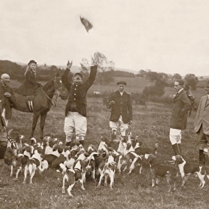 Foxhunting group with hounds