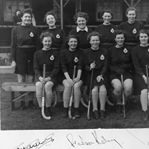 Group photo, women police officers in hockey team