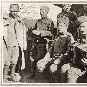 A group of Russian soldiers in camp accompanied by their musical instruments