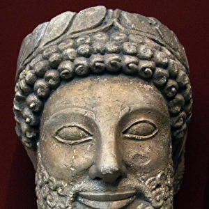 Head from a statue of a bearded man with laurel wreath. 5th