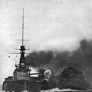 HMS Monarch firing her broadside, August 1914