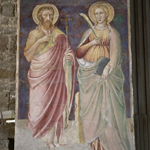 Italy. Florence. Mural painting with saints and stoup. 14th
