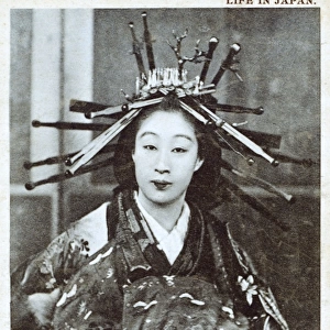 Japan - Geisha Girl with elaborately pinned hair