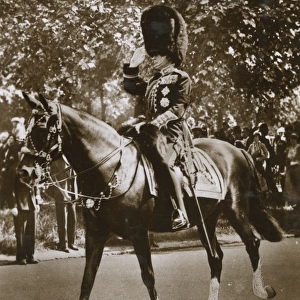 King Edward VIII on horseback - taking a salute