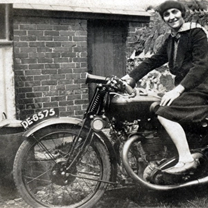 Lady on a 1930 Raleigh motorcycle