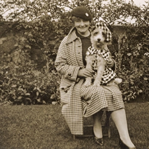 Lady with dog in fancy dress