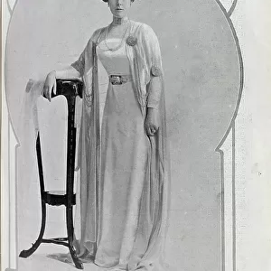 Lady Hardinge of Penshurst, formal studio portrait in gown and pearls. Captioned, The First Lady in India'. With description, Lady Hardinge of Penshurst: Who sails for India next month with her husband