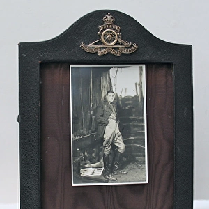 Leather photograph frame and badge of the Royal Artillery