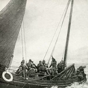 Lifeboat crew in action at sea, English coast