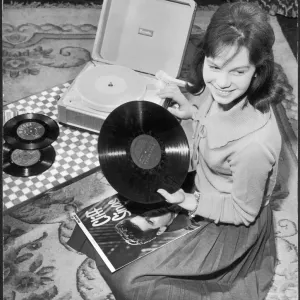 Print of a teenage girl listening to records Print of a teenage girl listening to records