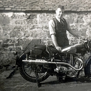 Man with 1935 BSA Sports Blue motorcycle