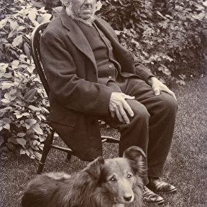 Man with a dog in a garden