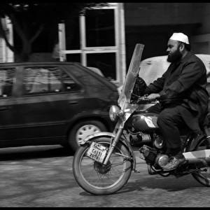 Man on Motor bike Cairo, Egypt