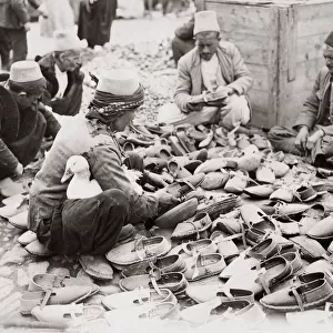 Market, Tirana, Albania, 1933, shoe seller and duck