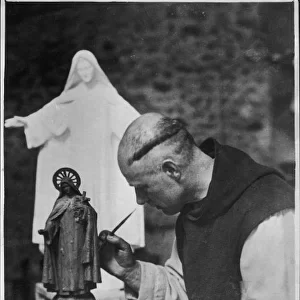 Monk Paints Statuette