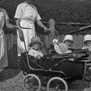 Nannies with children in pushchairs