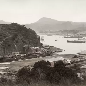 Naval arsenal at Nagasaki, ship in dry dock, Japan