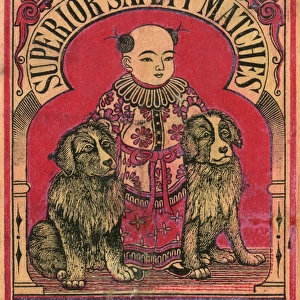 Old Japanese Matchbox label with a boy and two dogs