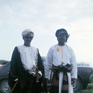 Two Omani elders in traditional dress