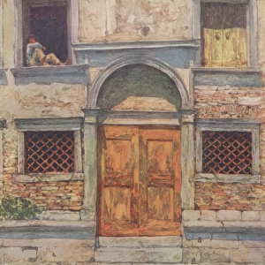 The orange door - Venice, Italy