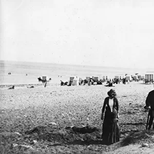 People on the beach at Colwyn Bay, North Wales