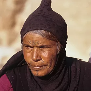Portrait of mature Bedhouin Syrian woman with facial tattoos
