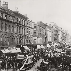 Procession down a busy London street, c. 1890