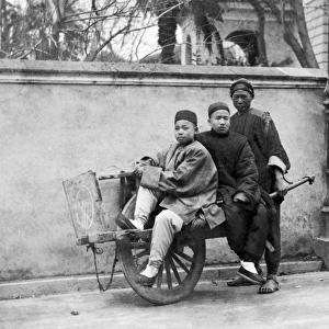 Riding on a wheelbarrow, China
