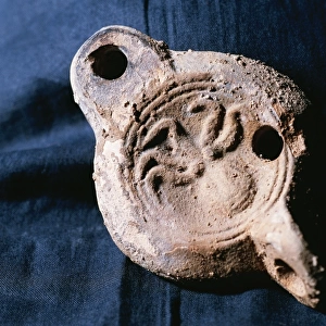 Roman oil lamps. Terracotte. Octopus decoration. From Catalo