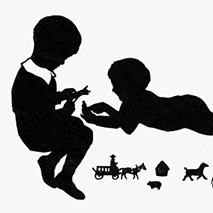 Silhouette of two children with cutout toys