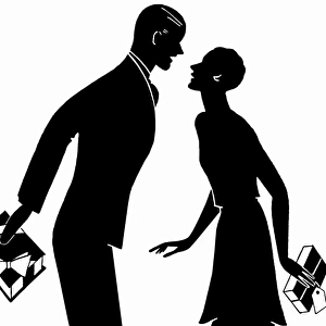 Silhouette of couple giving each other Christmas presents