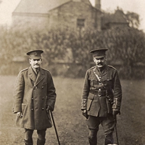 Two soldiers with a dog in a garden